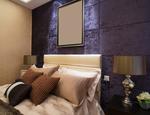 Ściana tapicerowana w sypialni - pomysł na aranżację w stylu glamour